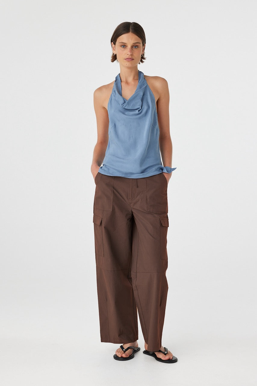 Model wears Alessia Halter Top with relaxed trousers, styled for soft drape and comfort