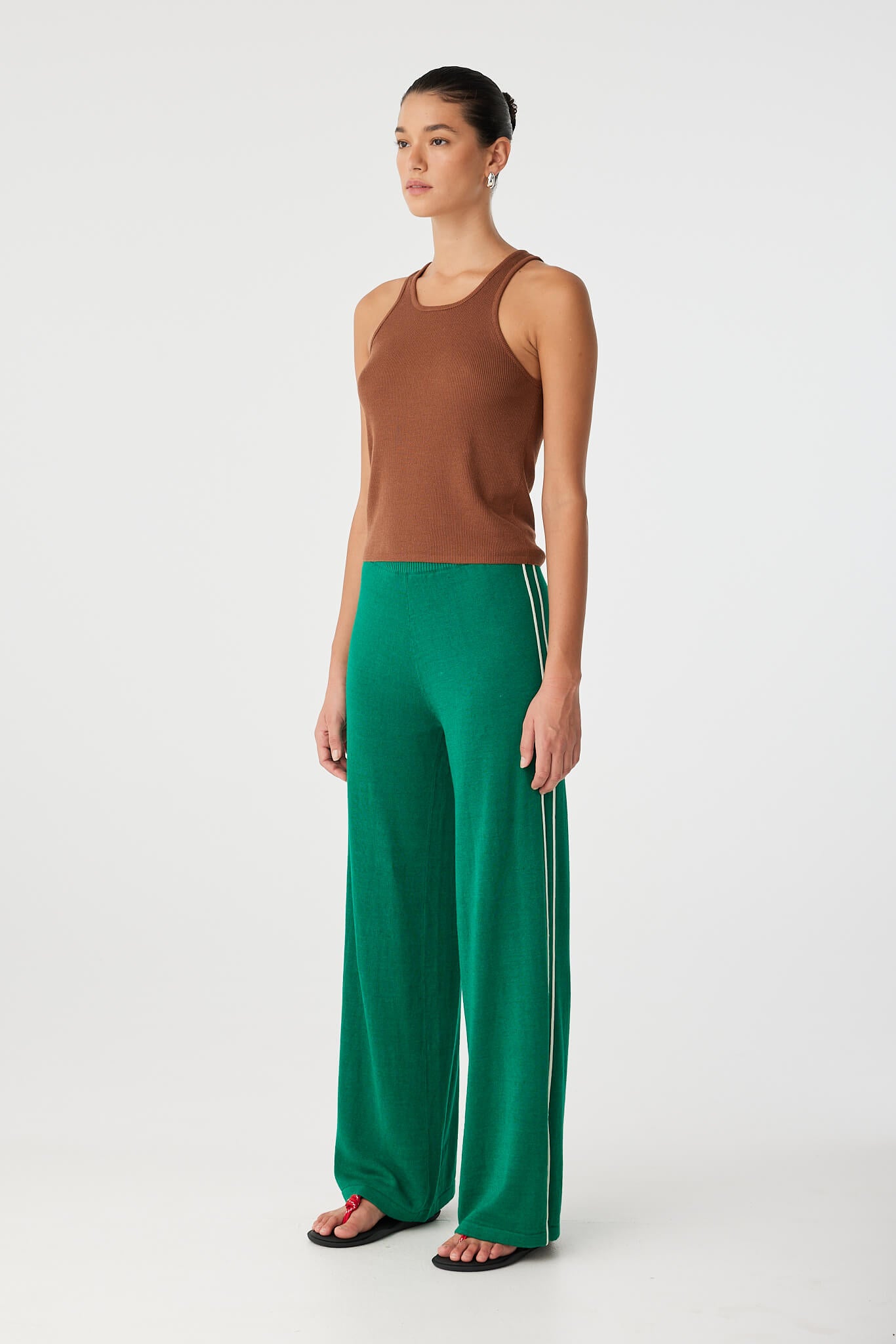 Full side profile of ribbed clay tank with breathable fit and smooth finish.