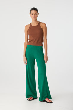 Model wears sculpted clay tank with fine rib texture and soft sheen.