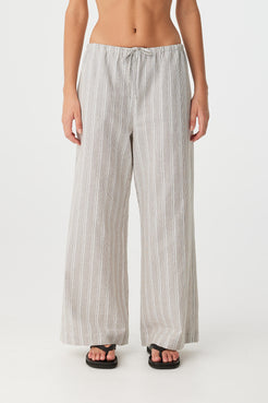 Front view of wide-leg striped cotton pant with drawstring waist and airy drape.