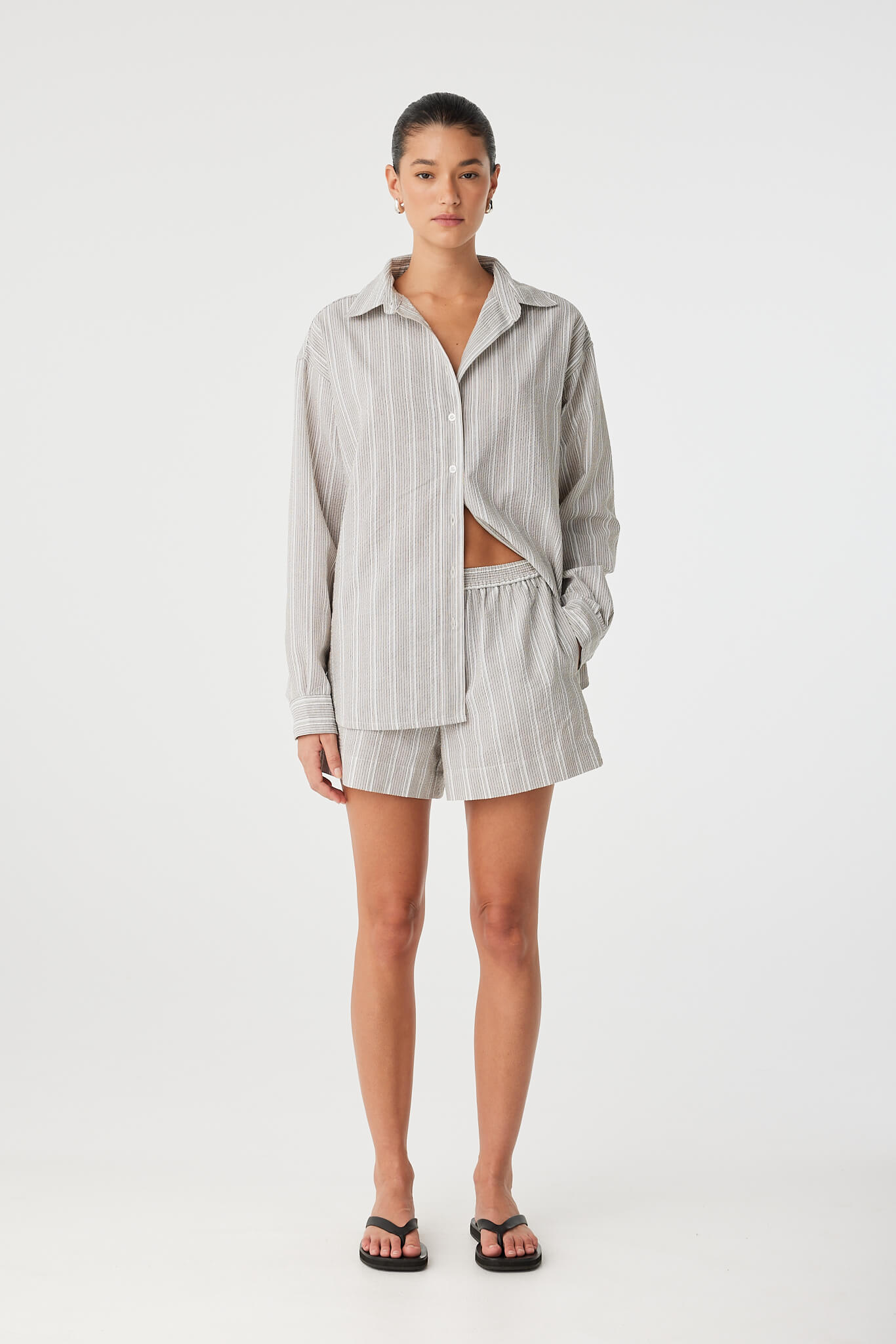 Full striped set showing fit and drape of the shorts and shirt.