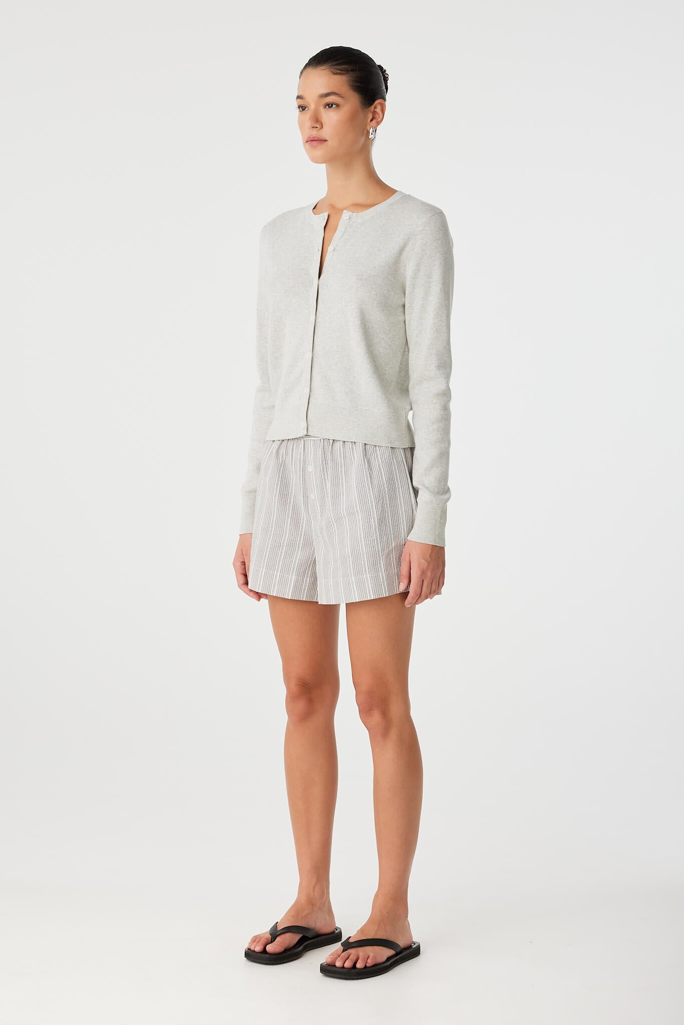 Side view of matching lounge set styled with shirt and Ines short.