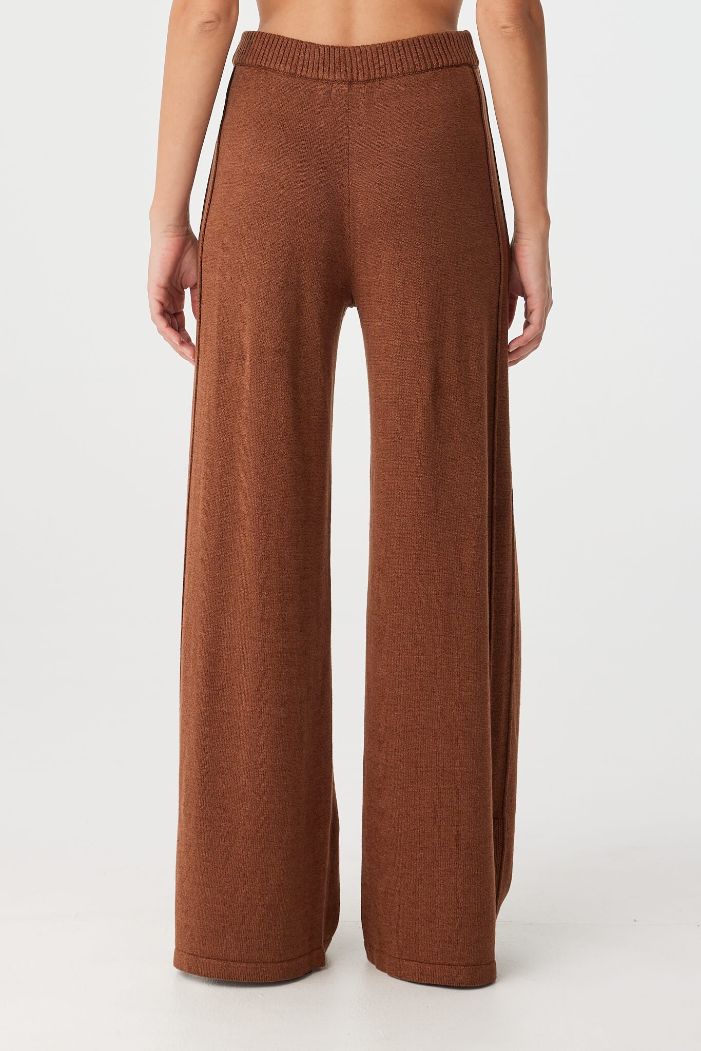Back view of Poppy Pant in clay, highlighting straight leg and soft waistband.
