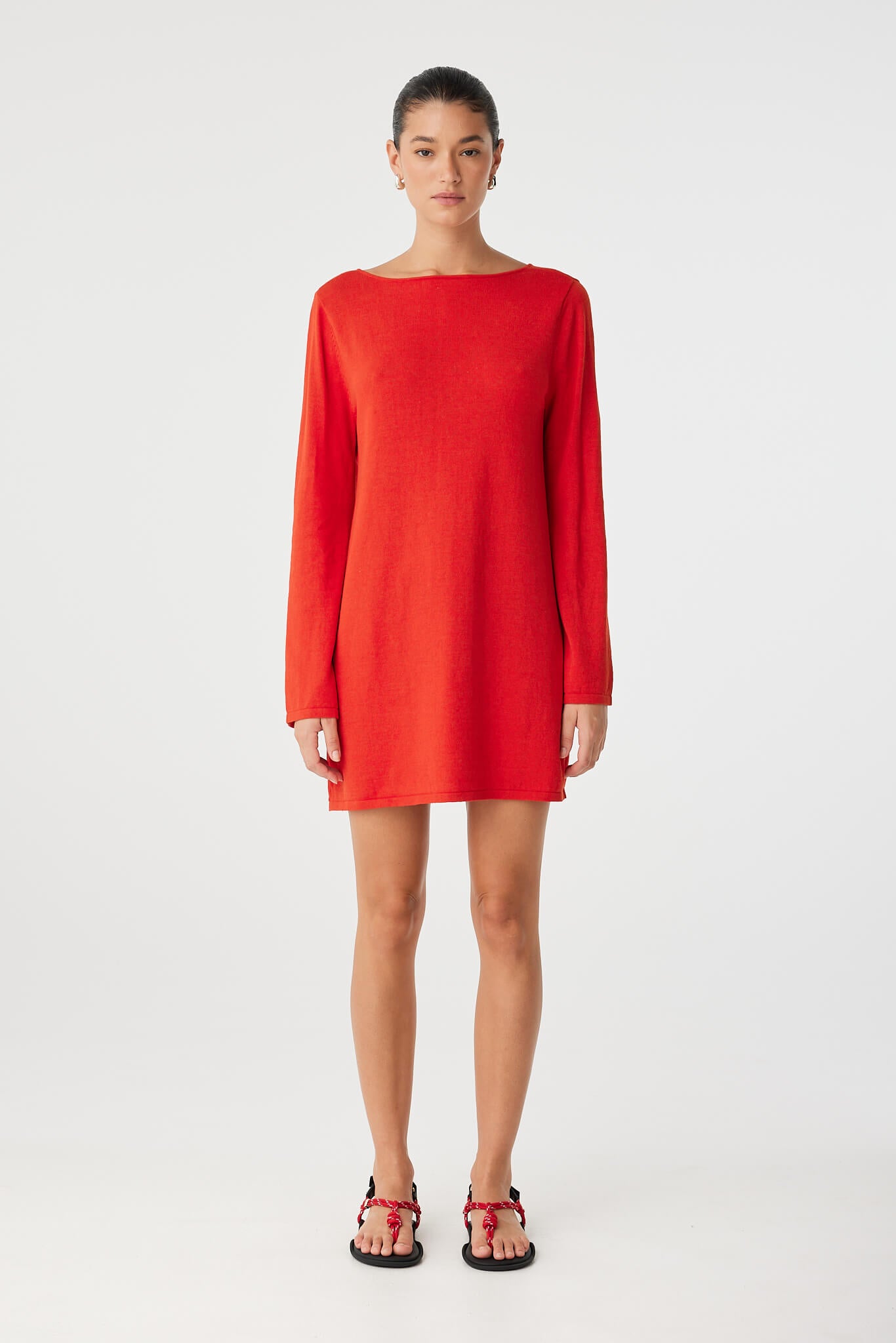 Front view of Paloma Dress worn with high neckline and clean finish, showing soft structure in cherry red textured weave.