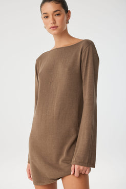 Close-up of cacao linen–cotton texture and long sleeve fit.