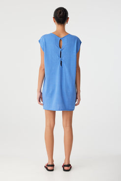 Back view of Pala Dress worn with twist cut-out at upper back—reversible design offers two looks in one, ideal for minimal wardrobes.