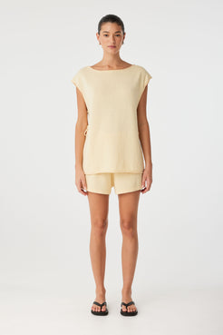 Full look of Poppy Short and Tie Side Top set in butter yellow linen blend.