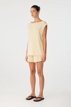 Relaxed styling of Poppy Top showing side opening and breezy movement.