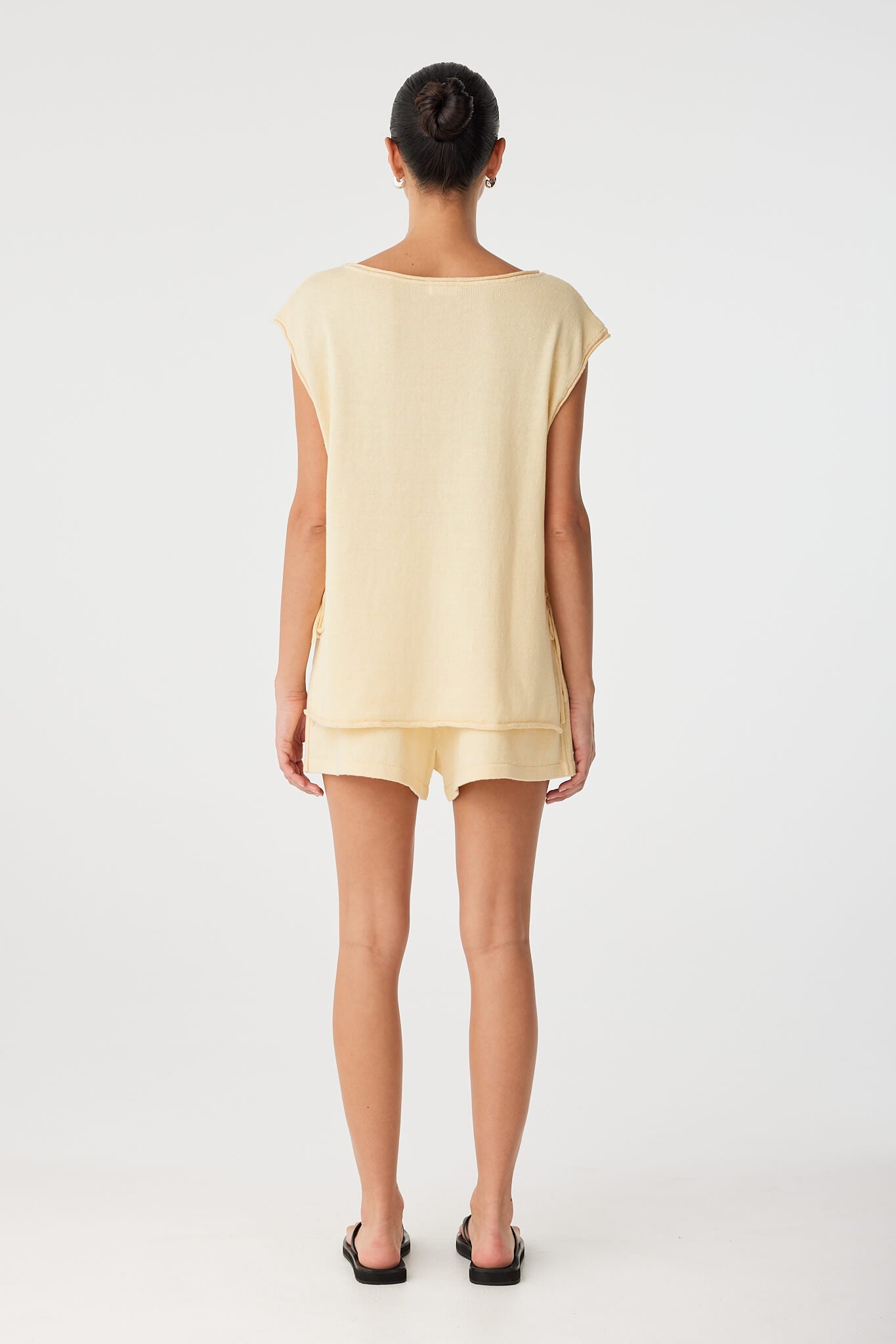 Full-body view of relaxed-fit shorts in lightweight linen–cotton.

