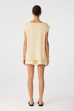 Full-body view of relaxed-fit shorts in lightweight linen–cotton.

