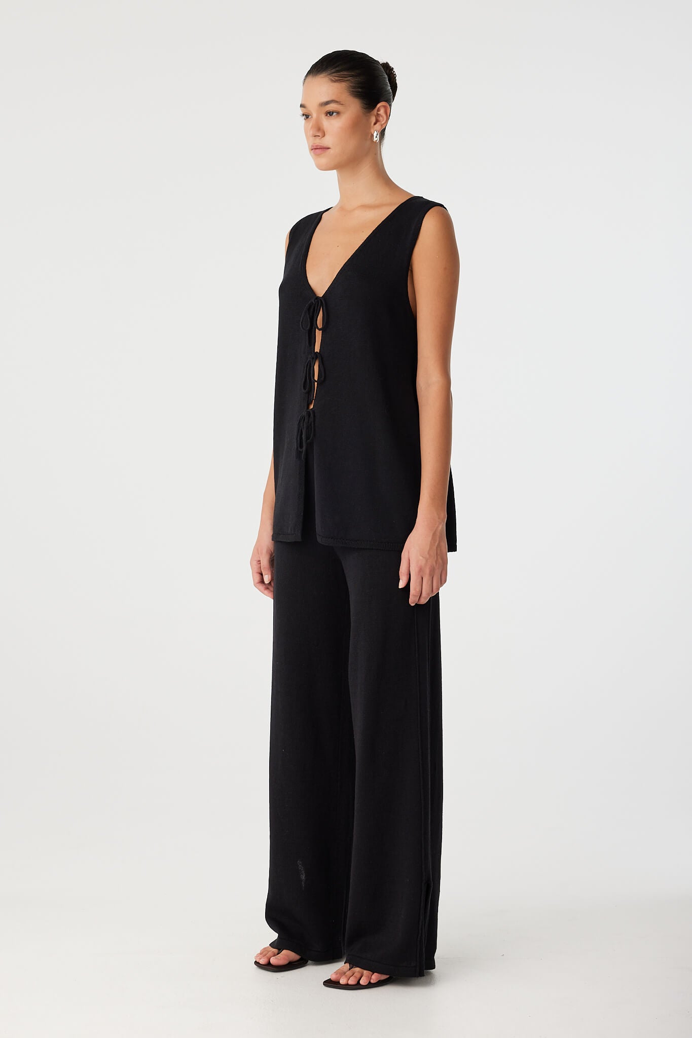 Side view of Poppy Pant showing fluid movement through the leg and clean waist finish—minimal and versatile.