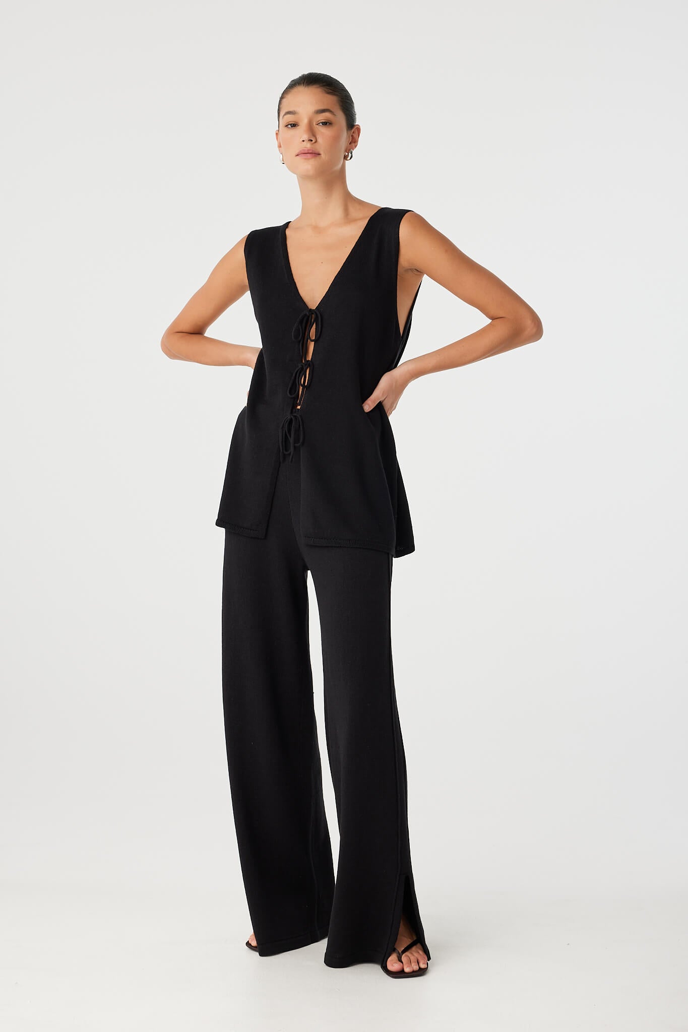 Full look with matching top and wide-leg pant, styled for elevated day-to-night ease in breathable black cotton–linen.
