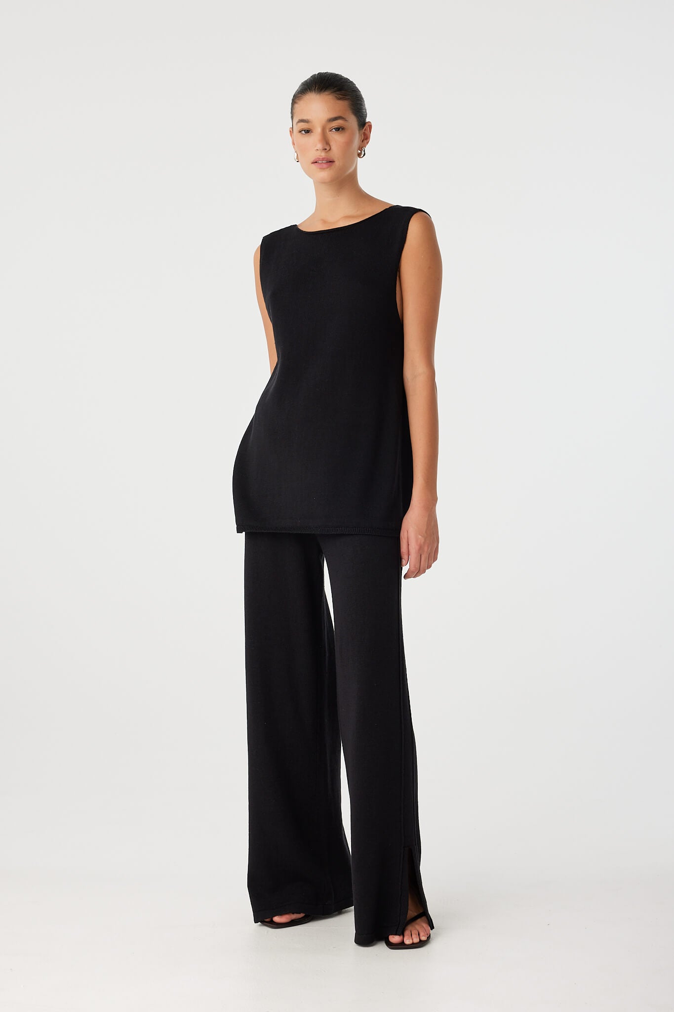 Side view of Poppy Top worn reversed with high neckline, showing clean silhouette and soft drape.