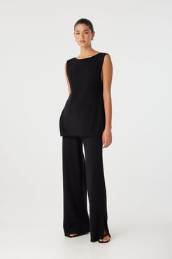 Side view of Poppy Top worn reversed with high neckline, showing clean silhouette and soft drape.