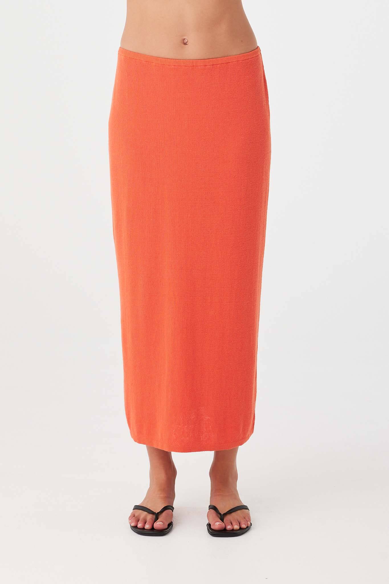 Orange (mandarin) rib knit skirt with longline silhouette, crafted in lightweight organic cotton hemp blend.