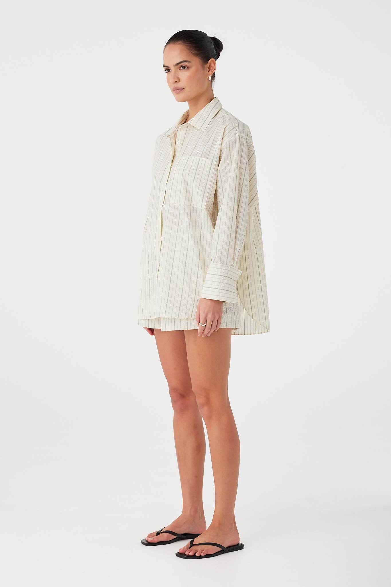Relaxed-fit striped cotton boxer short in olive with lightweight breathable drape.