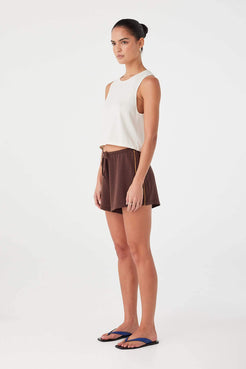 Relaxed-fit espresso linen cotton shorts with soft drape, drawcord waist, and side panel detail.