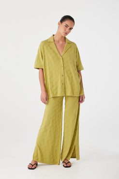 Model styled in matcha co-ord set with wide-leg pants. Relaxed drape and natural texture ideal for warm weather and trans-seasonal wear.