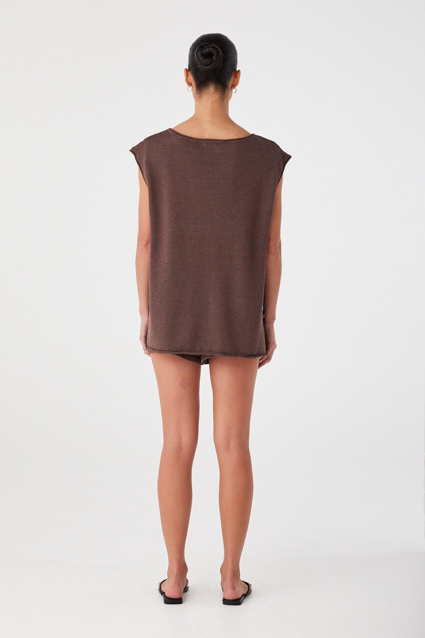 Back view of espresso shorts with elasticated waistband and soft structure. Lightweight and unlined for warm-weather ease.