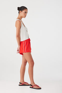 Warm-weather look with breathable natural shorts in a laid-back silhouette.