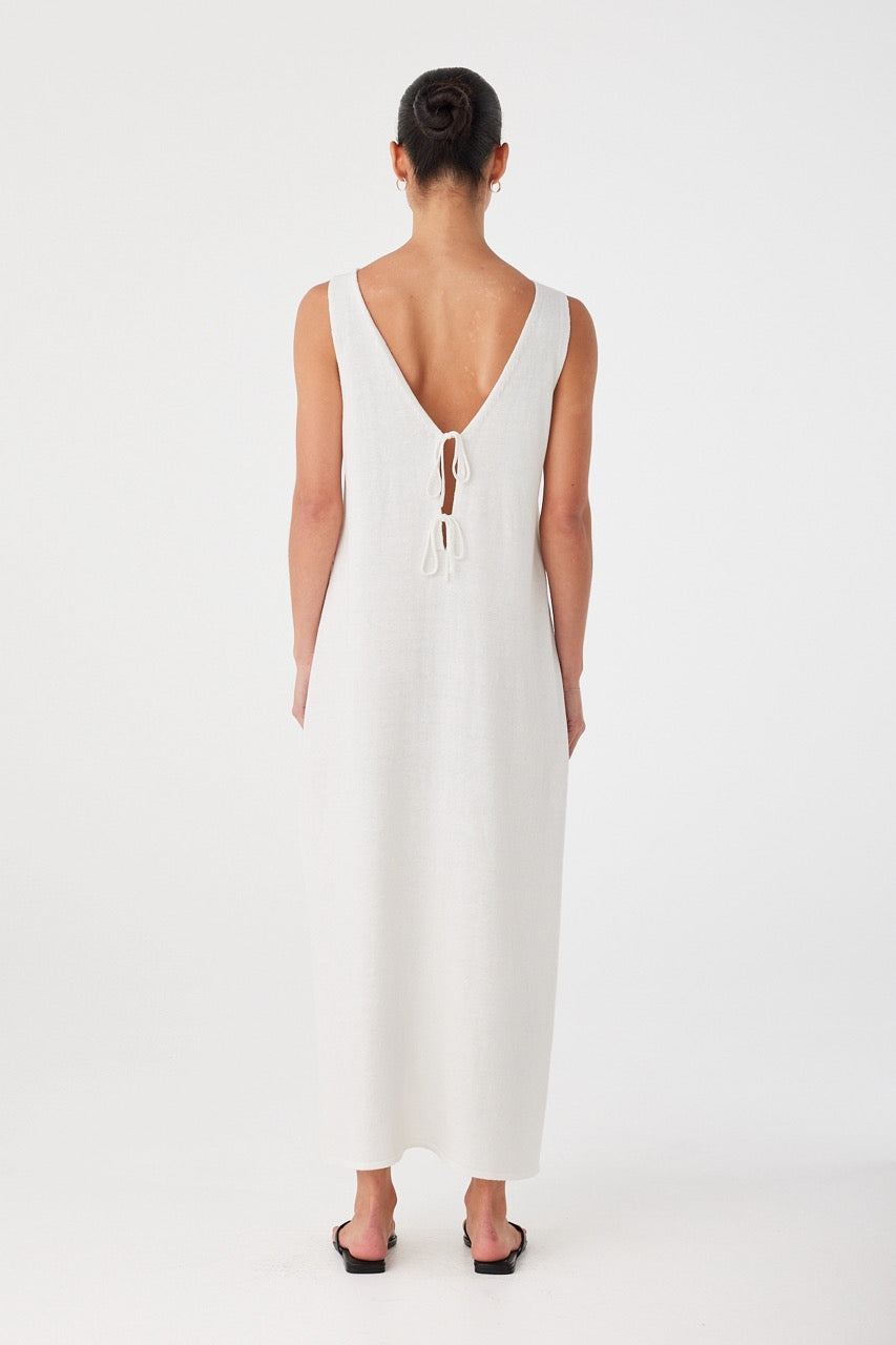 Softly scooped back detail and straight fall of the maxi dress, designed in cream natural fibre.