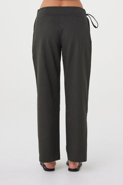 Back view of the Lucia Tie Pant in Charcoal featuring non-functional welt pockets and a clean tailored finish.