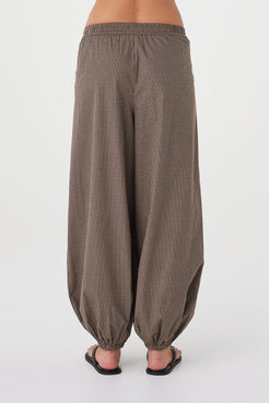 Back view of the Elina Balloon Pant in Chocolate Check highlighting the gathered balloon silhouette, elasticated back waist and micro check texture.