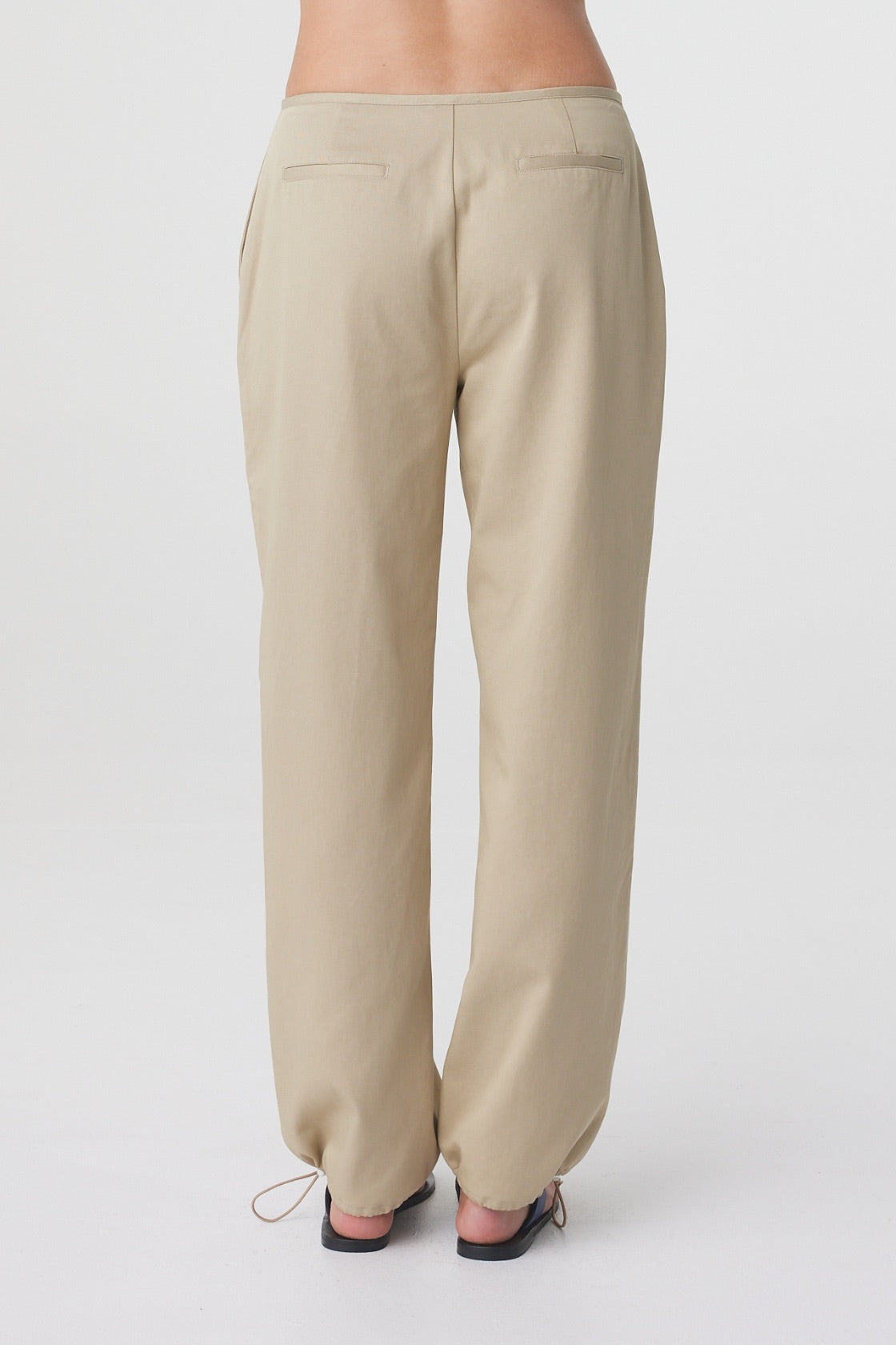Sabi Pant in Taupe, back detail view showing the fit through the waist and hips.

