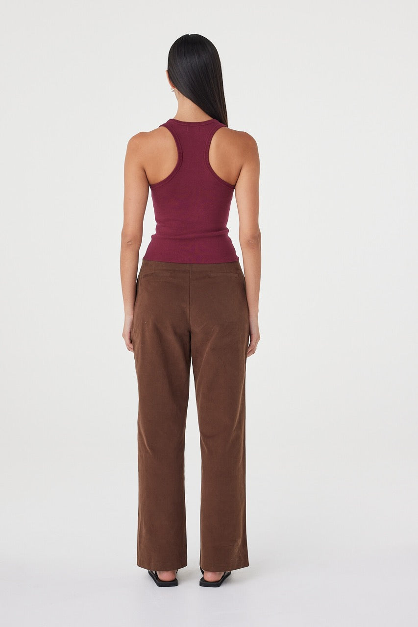 Back view of the Sable Top in merlot showcasing the racerback silhouette, fitted shape and soft knitted organic cotton texture