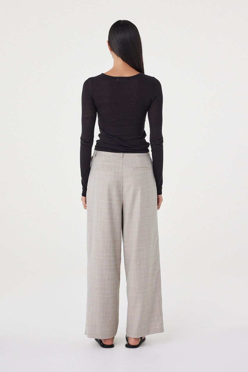 Rear three-quarter view of the  Calla Pant in Taupe Plaid showing the relaxed tailored fit and clean back profile.