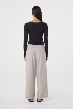 Rear three-quarter view of the  Calla Pant in Taupe Plaid showing the relaxed tailored fit and clean back profile.
