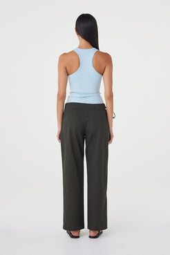 Rear three-quarter view of the Lucia Tie Pant in Charcoal featuring the clean back finish and relaxed tailored shape.