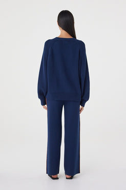 Back view of the Milan Pant in Navy & Tumeric showcasing the relaxed fit and straight wide-leg shape.