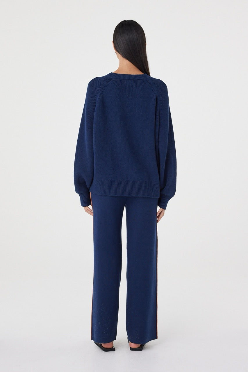Back view of the Milan Pant in Navy & Tumeric showcasing the relaxed fit and straight wide-leg shape.