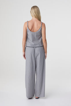 Sia Pant in Muted Blue Check styled with the matching top, back view showing the full length wide leg silhouette.