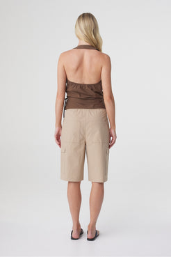Daria Short in Camel, back view showing the elasticated waistband and loose fit through the leg.
