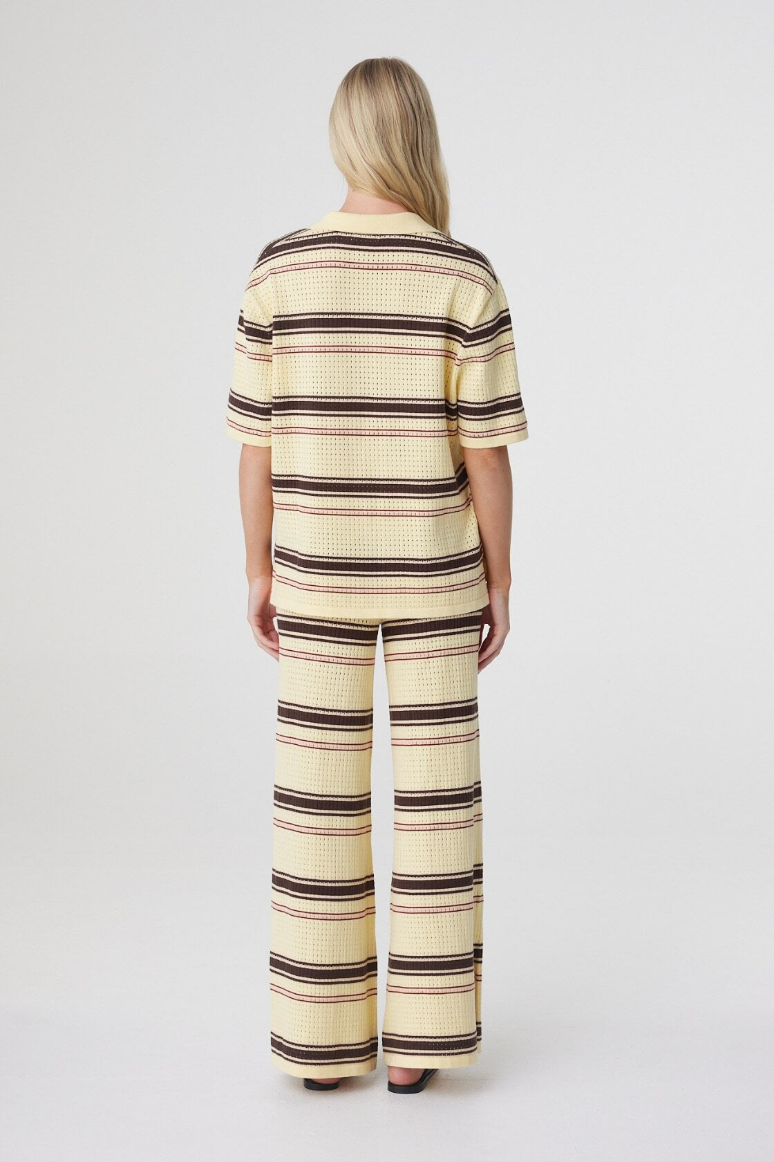 Willa Pant in Butter Espresso Stripe, back view styled with the Willa Shirt, highlighting the wide leg shape and custom horizontal stripe.