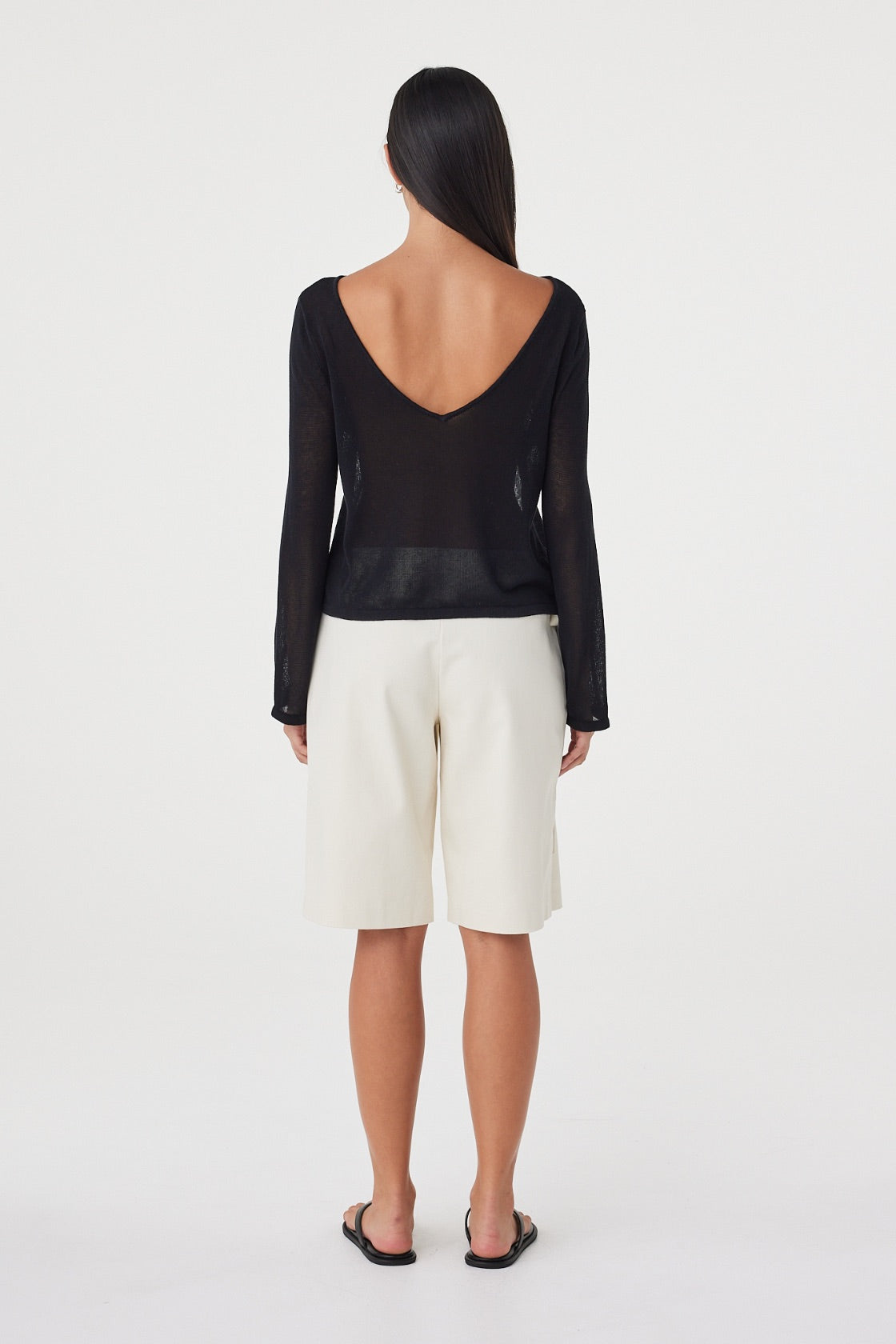 Back view of the Lucia Tie Bermuda Short in Bone showcasing the clean waistband and relaxed Bermuda-length fit.