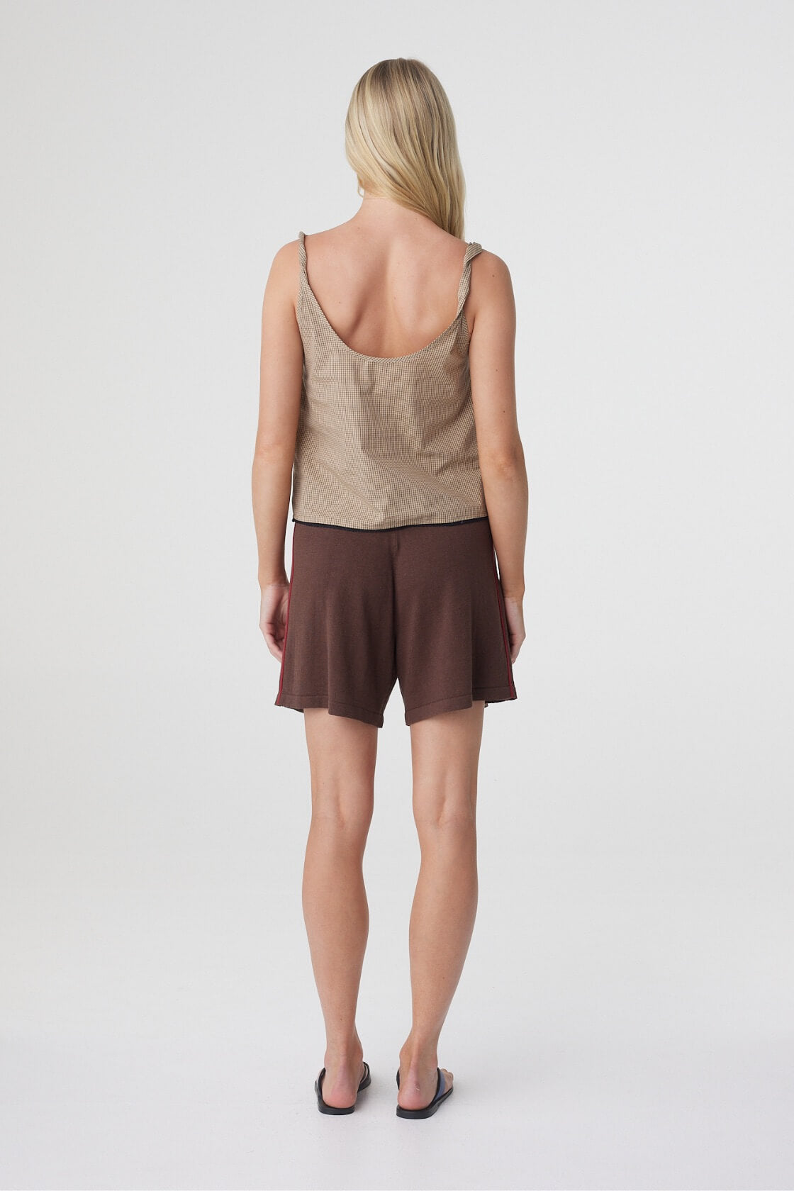 Pippa Midi Short in Espresso & Chilli, back view showing the relaxed shape through the hip and leg.