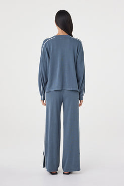 Back view of the Pippa Pant 2.0 in Storm & Cream featuring the elasticated ribbed waistband and relaxed fit through the leg.