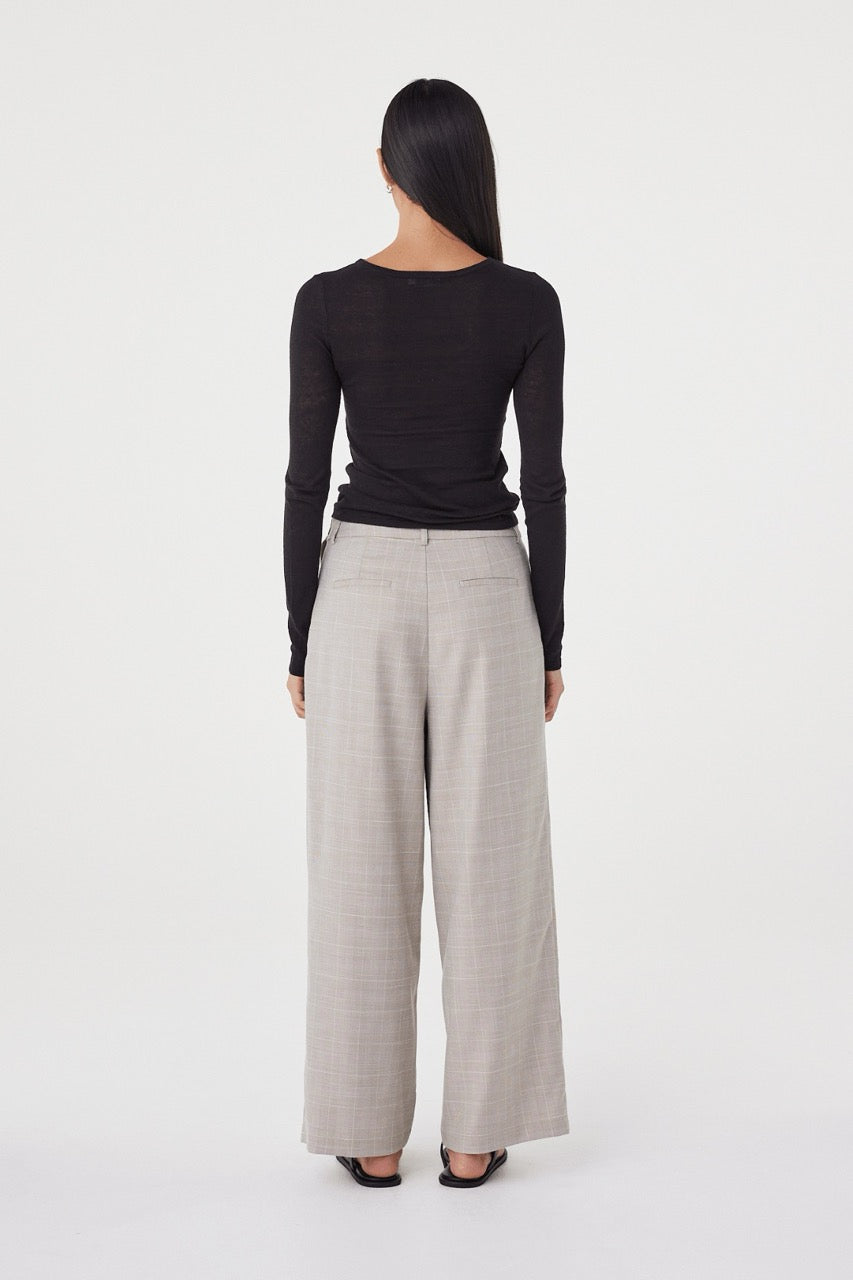 Back view of the Aston LS in Black featuring a fitted silhouette, long sleeves and smooth finish throughout.