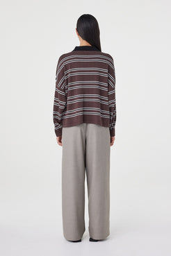 Back view of the Rayne Knit in espresso, black and cream highlighting the oversized silhouette, soft cotton knit finish and horizontal stripe artwork throughout
