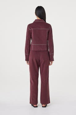 Back view of the Benny Jacket in Merlot featuring contrast stitching across the back and a clean tailored silhouette.