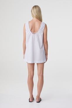 Isla Mini Dress in Blue Pinstripe, back view showing the low scooped back, relaxed fit and fine vertical pinstripe.