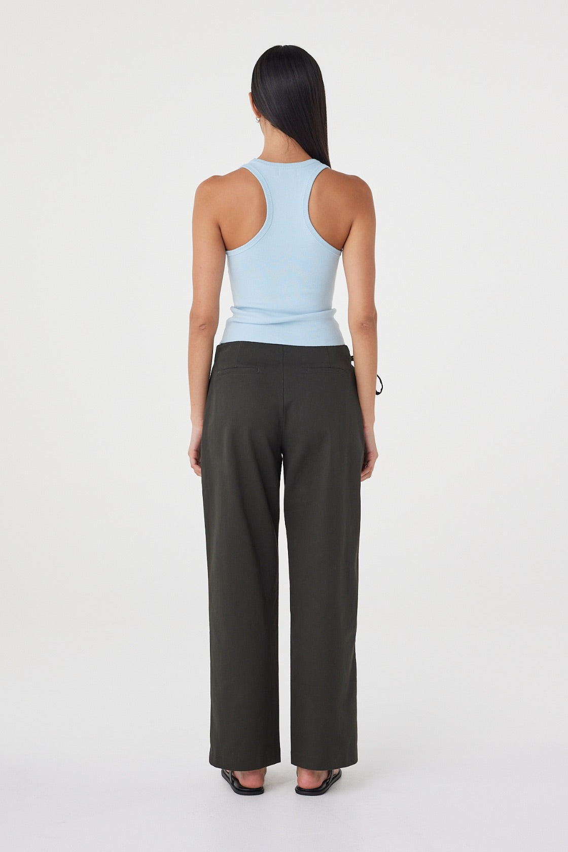 Back view of the Sable Top in Pale Blue featuring wide straps, a clean back neckline and fitted silhouette.