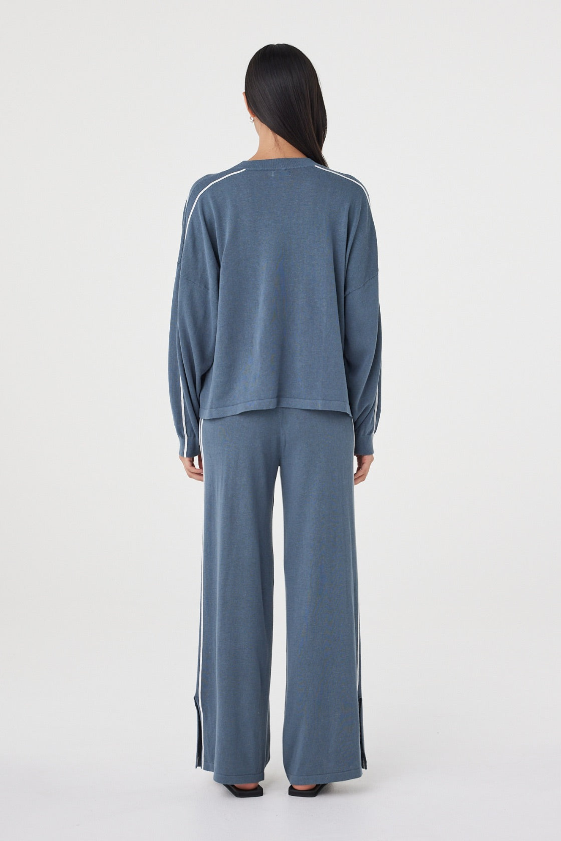 Back view of the Pippa Longsleeve Tee in Storm & Cream showcasing the relaxed silhouette, lightweight knit construction and contrast stripe detailing throughout.