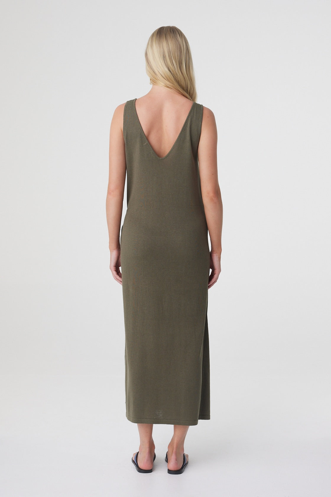 Sarina Wrap Maxi Dress in Smokey Olive, back view showing the deep V back neckline and relaxed maxi silhouette.