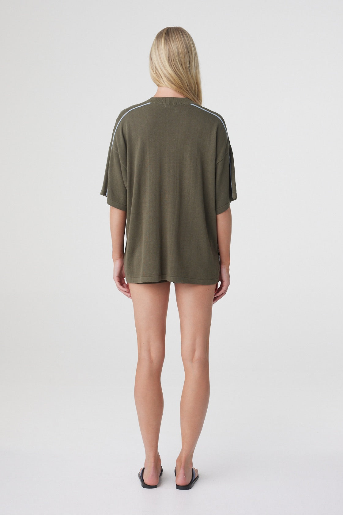 Pippa Oversized Tee in Smokey Olive and Dusk Blue, back view showing the oversized shape and relaxed sleeve.