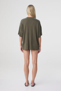 Pippa Oversized Tee in Smokey Olive and Dusk Blue, back view showing the oversized shape and relaxed sleeve.
