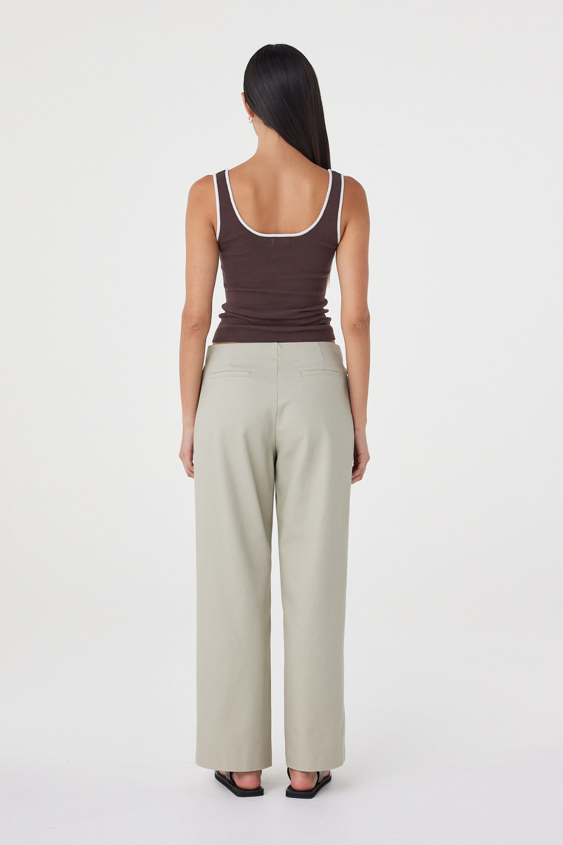 Back view of the Kaya Tank in Espresso & Cream showcasing the slim silhouette, contrast trim and clean knitted finish.